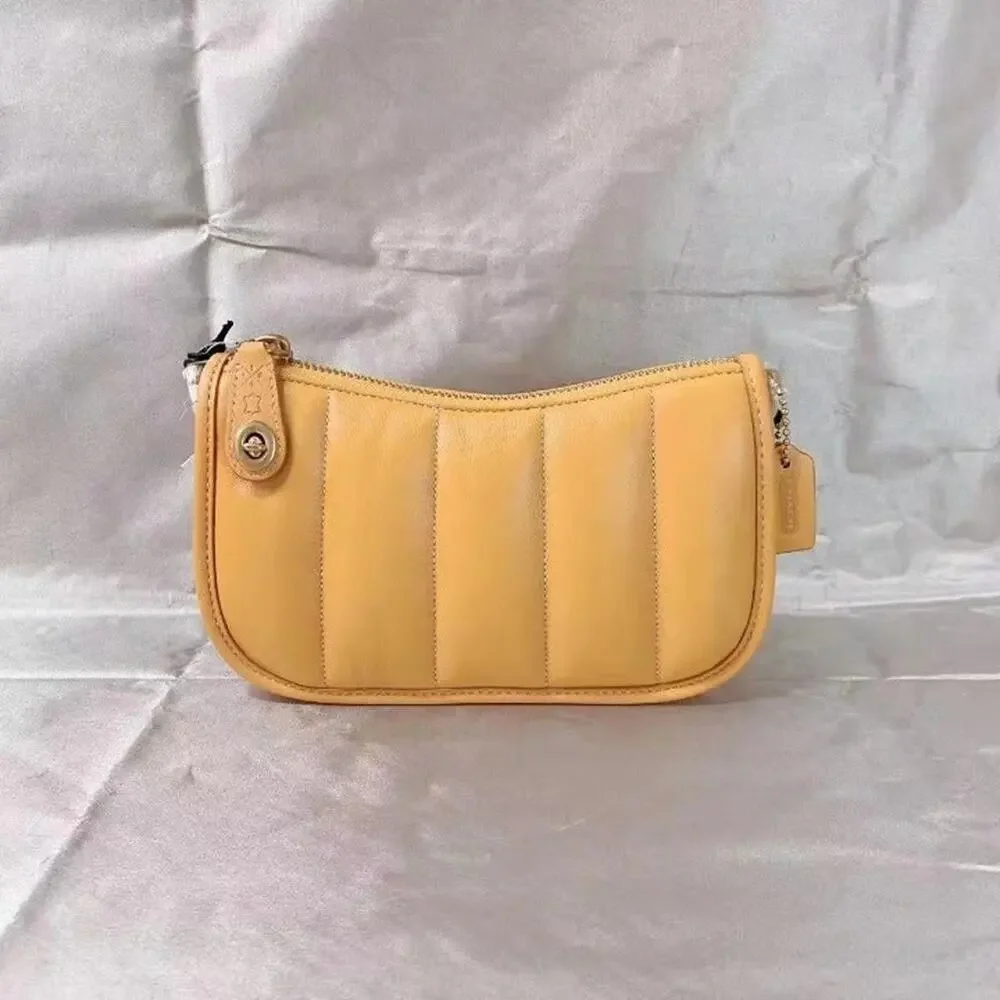 Coach C3490 Swinger 20 With Quilting In Brass/Buttercup